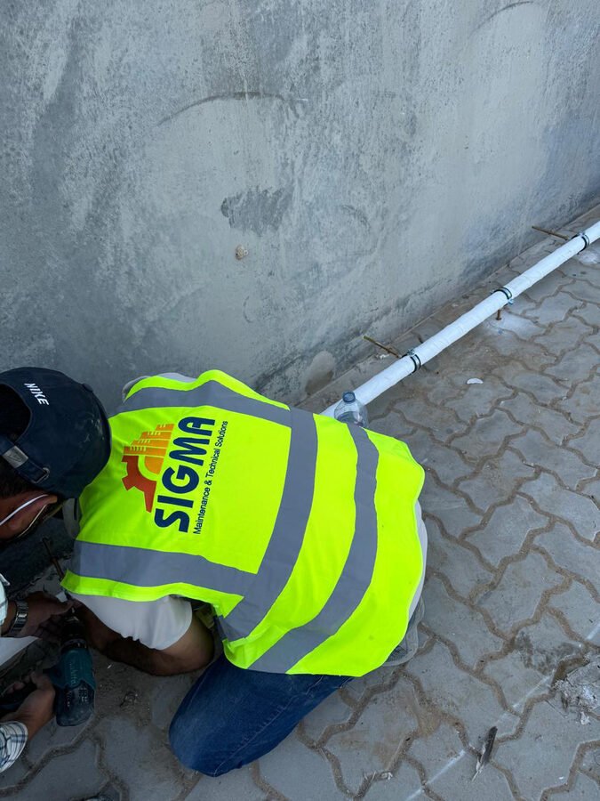 SIGMA technician finishing paving detail